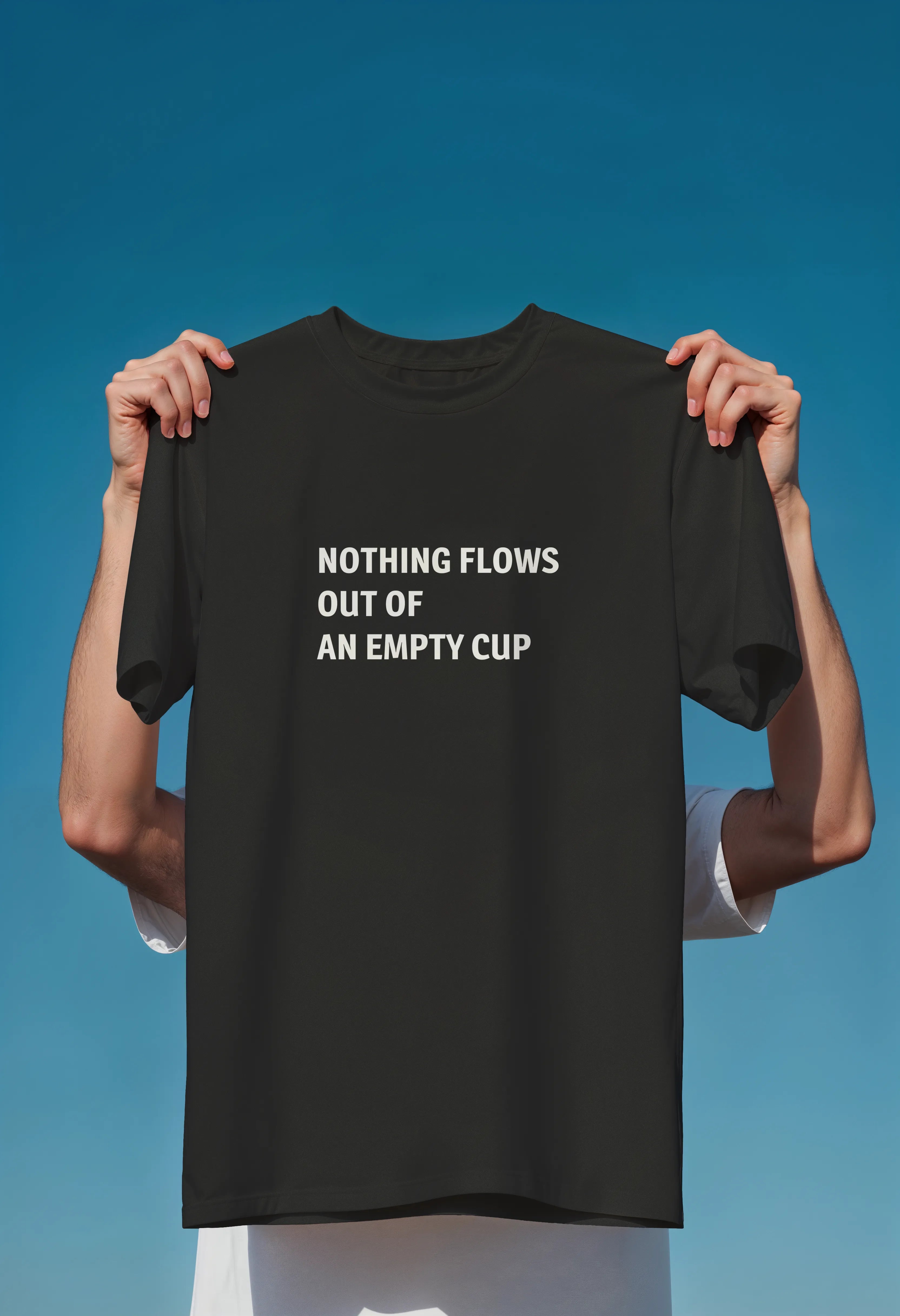 Nothing flows out of an empty cup Graphic T-Shirt – Unisex Cotton Tees